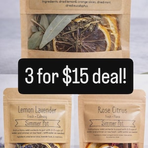 May include: Three brown paper bags with clear windows, labelled "Citrus Mint," "Lemon Lavender," and "Rose Citrus" Simmer Pots. Each contains dried herbs and citrus slices. The text "3 for $15 deal!" is displayed on a black background.