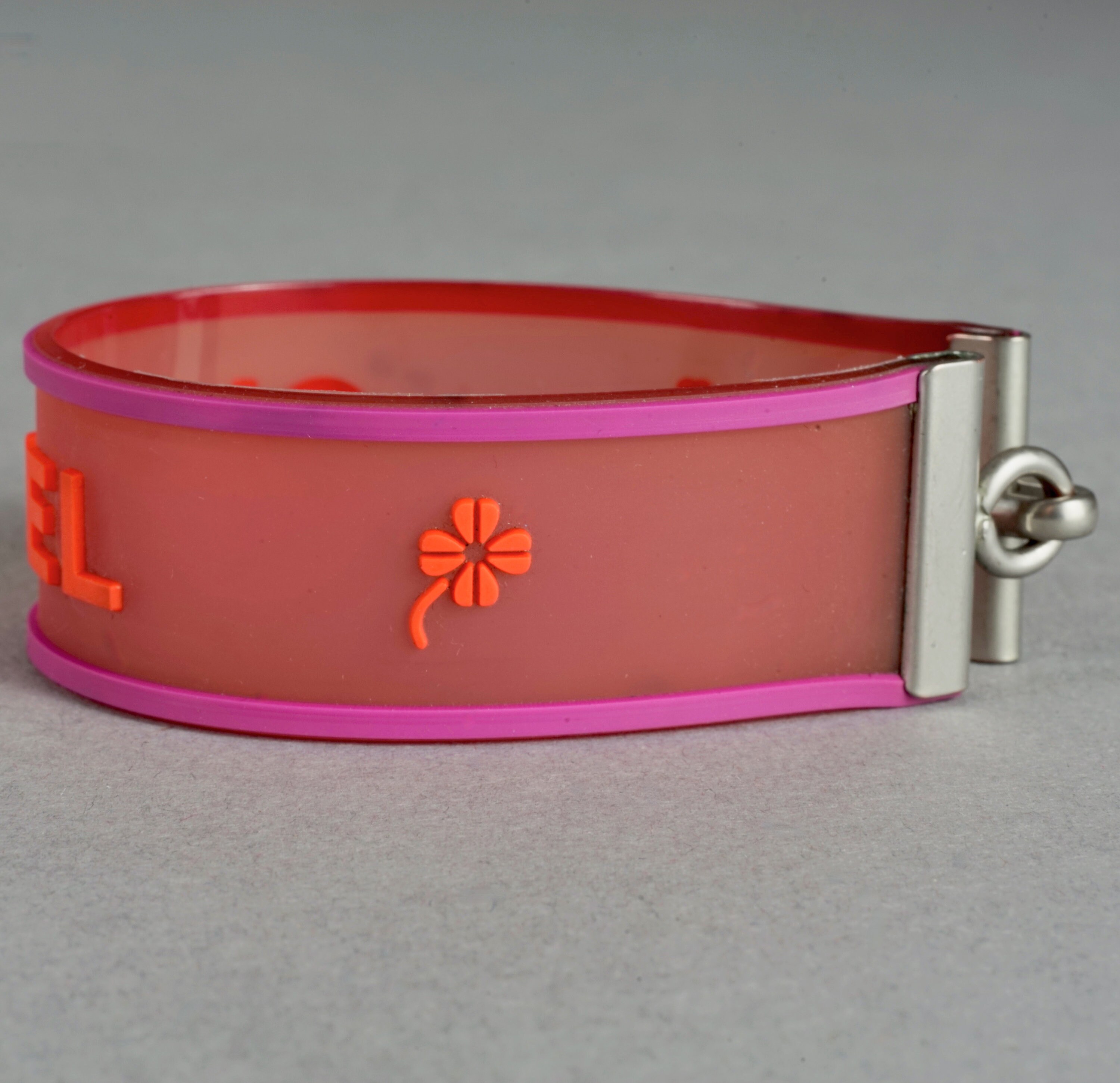 Vintage 2001 CHANEL Logo Camellia Pink Orange Rubber Cuff Vintage 2001 CHANEL Logo Camellia Pink Orange Rubber Cuff