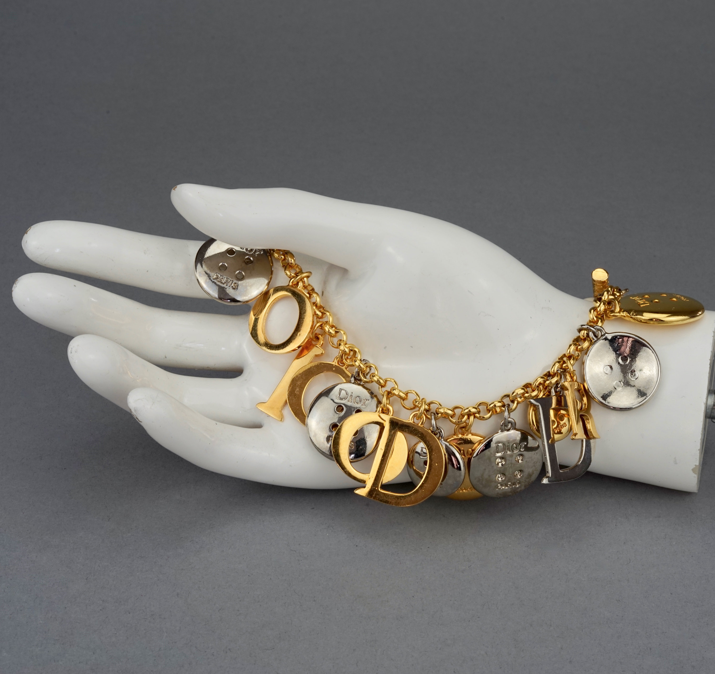 Vintage Iconic CHRISTIAN DIOR Letters and Buttons Charm Bracelet