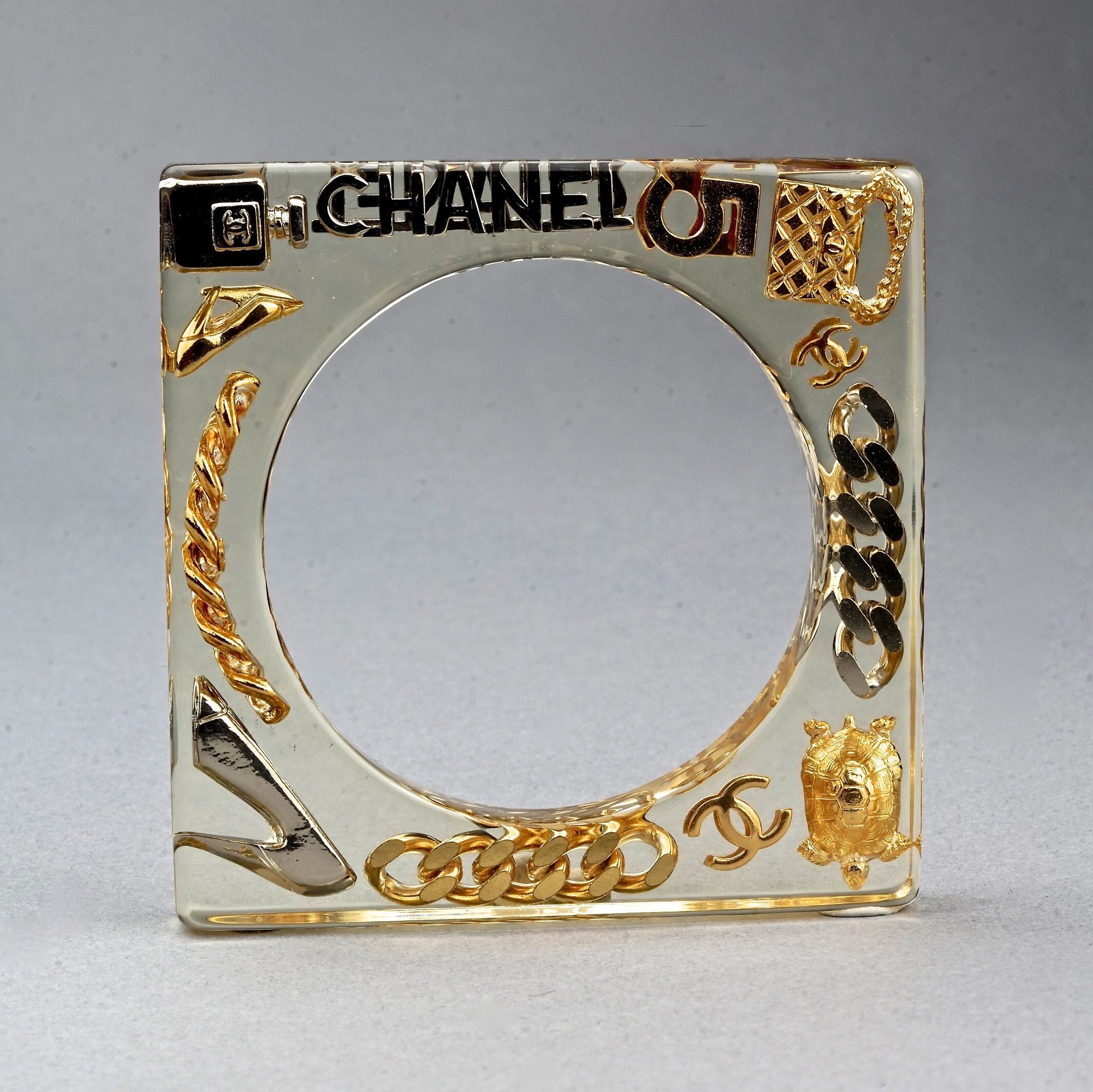 Vintage 1997 CHANEL Iconic Charms Lucite Plexi Square Bangle Vintage 1997 CHANEL Iconic Charms Lucite Plexi Square Bangle