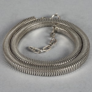 Collana in argento con catena a serpente CHRISTIAN DIOR vintage del 1973