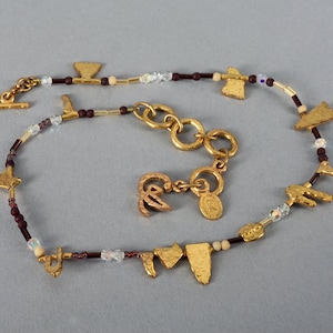 vintage CHRISTIAN LACROIX collier de perles abstraites dorées