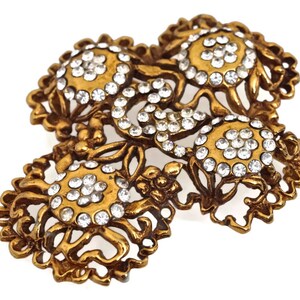 クリスチャン・ラクロワの象徴的なブルヘッドブローチ • 1990