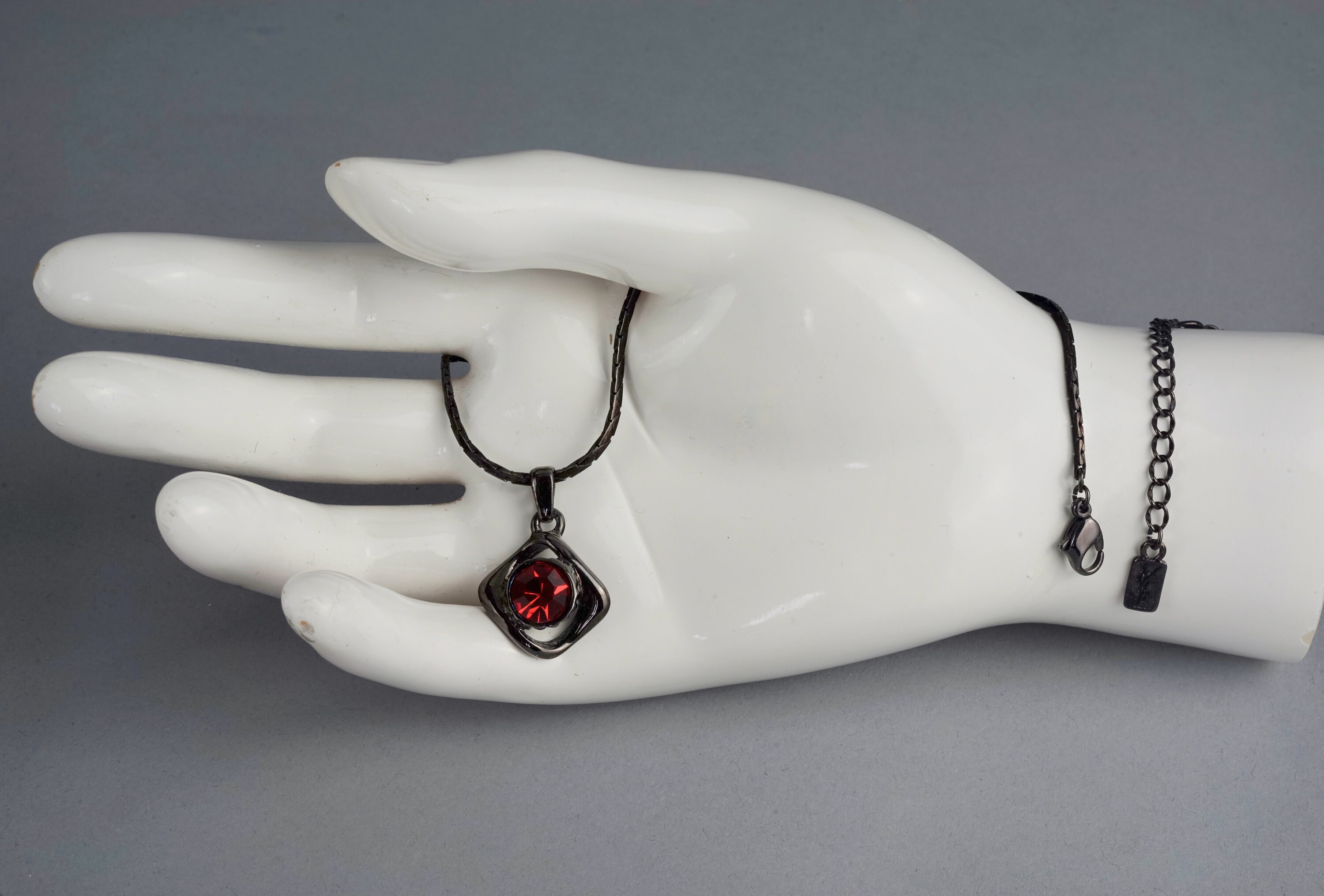Vintage YVES SAINT LAURENT Ysl Gunmetal Ruby Rhinestone Pendant