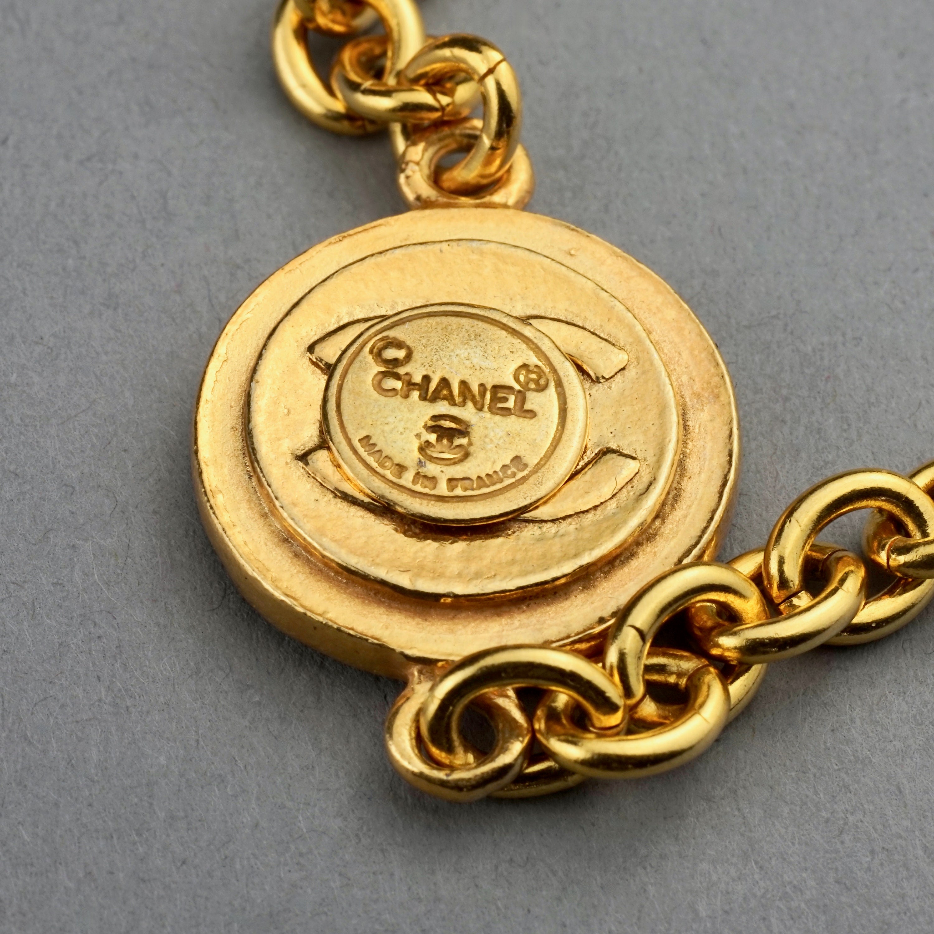 Lot - Vintage Chanel gold tone mirror pendant charm necklace with