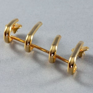 Vintage GIANNI VERSACE Quadruple Hook Modernist Brooch