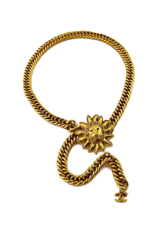 Vintage CHANEL CC Logo Sunburst Openwork Medallion Charm Necklace at  1stDibs
