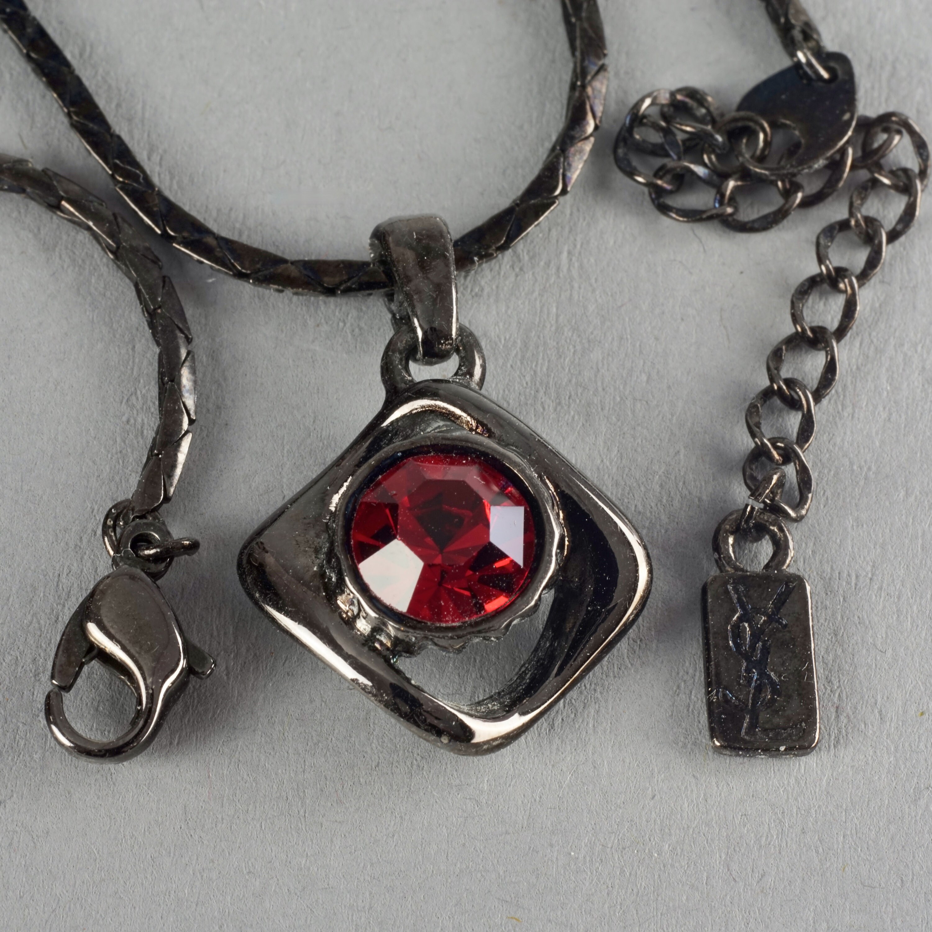 Vintage YVES SAINT LAURENT Ysl Gunmetal Ruby Rhinestone Pendant
