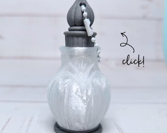 Quicksilver Stoneskin Elixir — Crystal Potion Bottle Fidget Clicker Keychain
