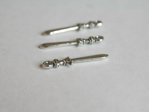 8 Sword charms antique silver tone SW15