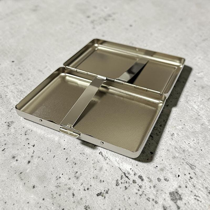 where can i find a cigarette holder Single Cigarette Holder in 316L Stainless Steel  BENJAMIN EDGAR, object  company