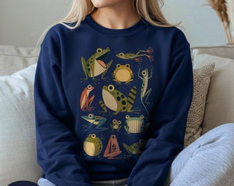 Sudadera con divertida tabla de especies de ranas, cuello redondo con diseño retro de anfibios de dibujos animados, regalo artístico de ranas gracioso para amantes de las ranas y entusiastas de la vida silvestre.