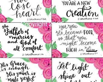 May include: A set of six printable cards with pink floral borders and inspirational quotes from the Bible. The quotes are: "Captive to obey Christ", "Do not lose heart", "The Father of mercies and God of all comfort", "Comfort one another. Agree. Live in peace", "In Christ, you are a new creation", and "For you He became poor, so that you might become rich in Him".