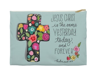 May include: A light blue zippered pouch with a floral cross design and the text "Jesus Christ is the same yesterday, today, and forever. Hebrews 13:8".