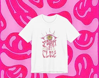 Eye with Smiley Coin graphic Tee | Don't Get Close text| pink grunge design