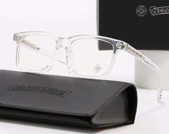 Okulary przeciwsłoneczne Clear Square Blue Light z detalami w kształcie srebrnego krzyża – unisexowe, nowoczesne oprawki uliczne