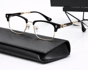 Gafas negras semi al aire con filtro de luz azul y detalles metálicos dorados – Monturas modernas de lujo unisex