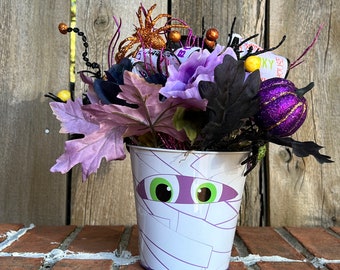 Halloween Floral Arrangment in Metal Mummy Pail