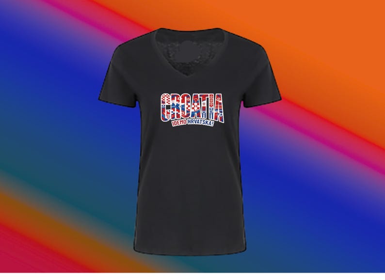May include: Black V-neck t-shirt with the word "CROATIA" in a red, white, and blue design. The text "IDEMO HRVATSKA!" is below the word "CROATIA". The shirt has short sleeves.