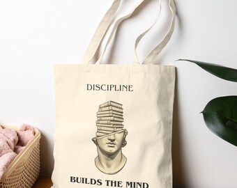 Discipline Builds the Mind tote bag | book stack brain illustration