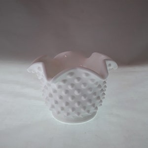 May include: White milk glass bowl with a ruffled rim and a textured, dotted surface.