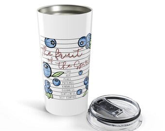 May include: A white stainless steel tumbler with a clear plastic lid featuring a blue blueberry pattern and the text "The fruit of the Spirit" followed by a list of virtues including love, joy, peace, patience, kindness, goodness, gentleness, and self control.