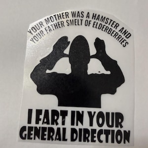 May include: A white sticker featuring a black silhouette of a person making a gesture with their hands near their head. The text reads: YOUR MOTHER WAS A HAMSTER AND YOUR FATHER SMELT OF ELDERBERRIES, and below the silhouette: I FART IN YOUR GENERAL DIRECTION.