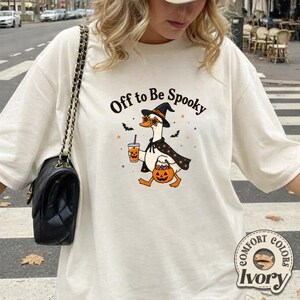 Off To Be Spooky Goose Holding Coffee Pumpkin Bucket T-Shirt T-shirt, Funny Halloween Goose Shirt, Fall Tee