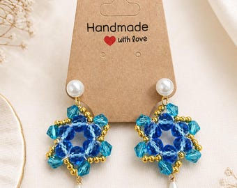 Earrings with half crystals and star-shaped beads
