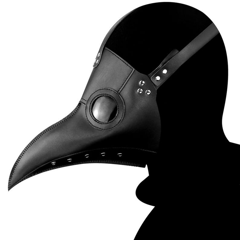 以下が含まれることがあります： 黒い革製のペスト医師マスク。長く湾曲したくちばしと、大きな円形のレンズが付いています。マスクには頭に固定するためのストラップがあり、リベットで装飾されています。コスチュームアクセサリーです。