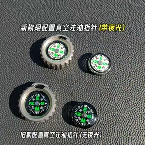 May include: Four compasses with black, white, and green details are displayed. The compasses have a silver metal casing. The text in the image reads "New model configuration vacuum oil pointer (with night light)" and "Old model configuration vacuum oil pointer (no night light)".
