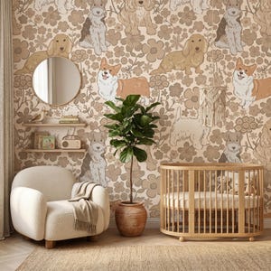 May include: Wallpaper featuring a repeating pattern of various dog breeds including corgis and dachshunds interspersed with stylized flowers in shades of beige, brown, and cream. The design covers the wall behind a nursery room setting.