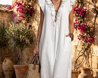 Elegant boho maxi dress with romantic ruffles. Iightweight fabric perfect for beach vacations, resort travel, and effortless summer style.
