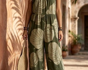 Stunning olive leaf-print wide-leg jumpsuit. Perfect for resort getaways & vacation.