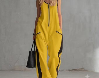Breathable sleeveless jumpsuit with zip front & black side stripes, perfect for casual-chic everyday wear