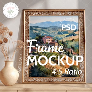 May include: A gold ornate frame mockup featuring a watercolour landscape of a Tuscan countryside. The artwork shows rolling hills, buildings, and vineyards. The frame has decorative detailing. Text on the image reads "Frame MOCKUP 4.5 Ratio" and "PSD".