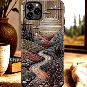 May include: A phone case in a weathered taupe colour featuring a relief-style landscape illustration of a winding river, rolling hills, pine trees, wheat stalks, and a large sun in the sky. The text WEATHERED TAUPE is printed at the bottom.