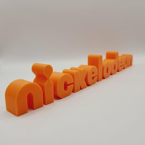 May include: An orange 3D-printed Nickelodeon logo, set against a white backdrop. The letters are chunky and curved, creating soft shadows. The logo is a well-known design, ideal for fans of the TV channel.