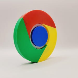 May include: A white ceramic mug with a black handle and the text "But First, Coffee" in a black, handwritten-style font. The mug is on a white surface.