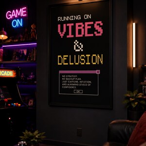 Retro gaming wall art printable in a black frame displayed in a stylish game room with arcade machine, neon lighting, gaming collectibles, leather sofa, and modern entertainment decor.
