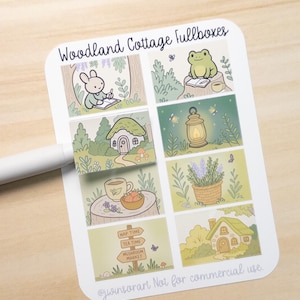 May include: A sheet of Woodland Cottage fullboxes stickers. The stickers feature whimsical illustrations of woodland scenes, including a rabbit writing, a frog reading, a mushroom house, and a signpost with directions to Nap Time, Tea Time, and Mushroom Market.