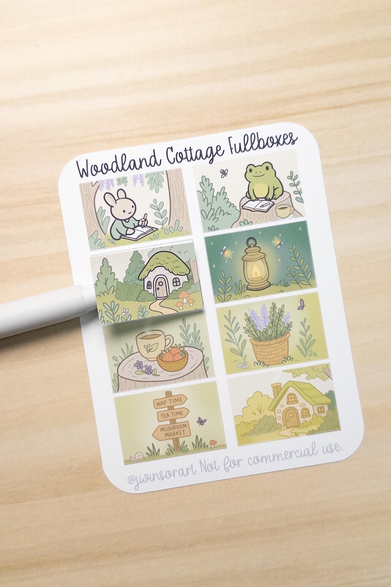 May include: A sheet of Woodland Cottage fullboxes stickers. The stickers feature whimsical illustrations of woodland scenes, including a rabbit writing, a frog reading, a mushroom house, and a signpost with directions to Nap Time, Tea Time, and Mushroom Market.