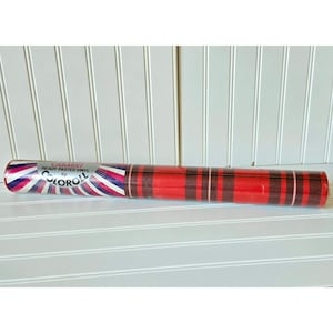 May include: A roll of "Cabaret" ready-pasted vinyl wallpaper. The roll is red with brown and white stripes. The end of the roll has a design with pink, blue, and white stripes and the "Coloroll" logo.