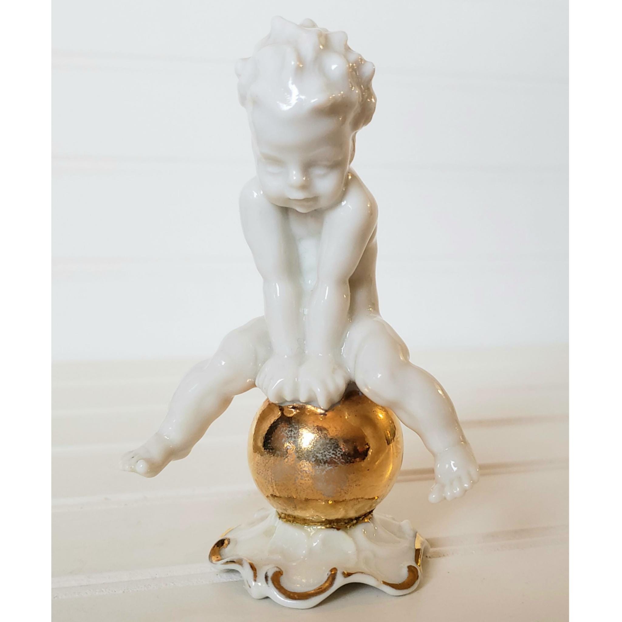 Vintage Hutschenreuther Figurine Karl Tutter Design of Boy Leap Frogging Gold Ball Figure Cherub