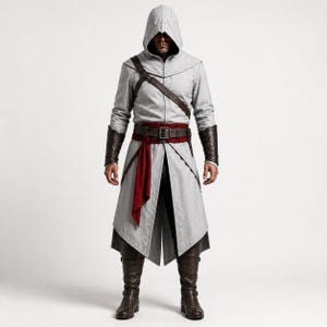 May include: A light gray hooded coat featuring a long, structured silhouette with a pointed hood. The garment includes a dark brown leather-like belt with a buckle, a deep red sash, dark brown forearm bracers, and matching knee-high boots.