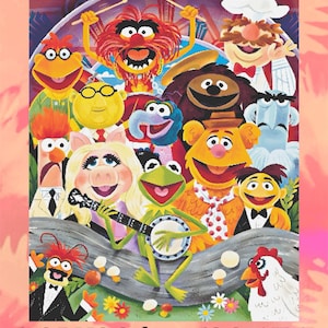 May include: A cross-stitch pattern featuring a colourful ensemble of Muppets characters. The design includes Kermit the Frog playing a banjo, Miss Piggy, and other beloved characters. The pattern is 59.2 cm x 73.4 cm and uses 150 DMC colours.