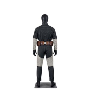 May include: A black and gray costume displayed on a mannequin. The outfit includes a short-sleeved top, pants with gray panels, a brown belt with pouches, and gloves. The mannequin is on a gray base.
