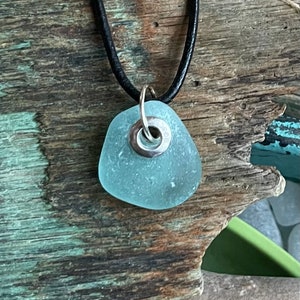 Sea glass jewelry- Aqua blue sea glass set with a sterling silver grommet