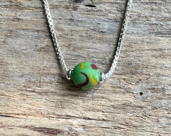 Genuine Sea glass Jewelry- Green Sea glass marble with yellow and red swirls necklace