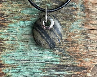 Beach stone jewelry- Striped beach stone set with sterling silver grommet.